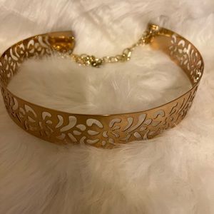 Fashionable bangle style belt.